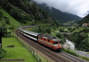 Re4/4 11109 still carries the attractive orange and grey Swiss Express colours. The loco was photographed climbing from Intschi to Gurtnellen with IR2173, the 12:03 from Basel SBB to Locarno, on 18 June 2010.