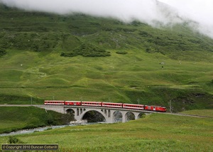 No.96 crossed the Furkareuss on the fine stone viaduct west of Hospental with train 538, the 11:08 from Visp to Andermatt, on 19 June 2010.   