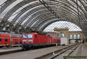 The 143 worked push-pull sets in the Dresden area almost invariably run with the loco at the east end, meaning that the loco is up against the buffers at Dresden Hbf. On 21 July 2010, 143.210 was at the opposite end of its train, making a departure shot possible as it left the low level platforms with RE38514, the 16:45 to Cottbus.