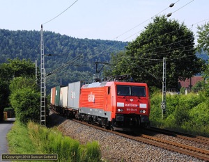 DB's class 189s are now permitted to run over the border into the Czech Republic but they're still not particularly common on trains east of Dresden. A gleaming 189.004 worked a westbound container train along the Elbe valley east of Kurort Rathen on the morning of 22 July 2010.
