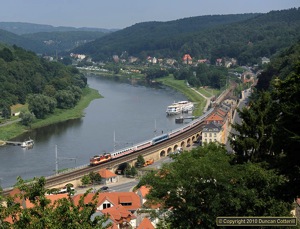 An unidentified Class 371 ran alongside the River Elbe at Königstein with EC174, the 05:28 from Budapest to Hamburg, on 22 July 2010.
