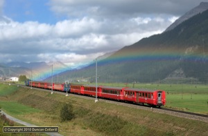 Ge4/4iii 652 replaced the expected pot of gold at the end of this rainbow near Bever on 28 August 2010. The loco was working RE1156 from St. Moritz to Chur.