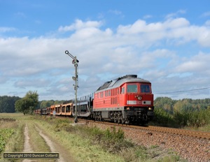 233.683 approached Särichen with an empty train of car-carriers bound for Poland on 6 October 2010.