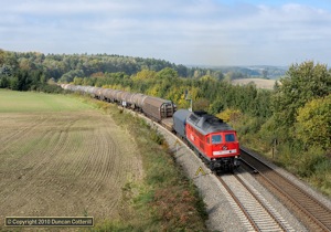 A long eastbound freight wound its way through the rolling Vogtland landscape behind 232.413 on 7 October 2010. The picture was taken near Christgrün, west of Herlasgrün.