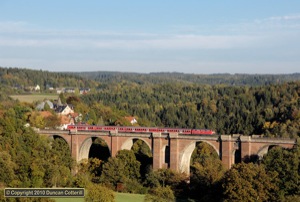 Another shot of 218.390, this time crossing the magnificent viaduct over the Elster Valley at Jocketa with RE3715, the 16:52 Reichenbach - Hof, on 9 October 2010.