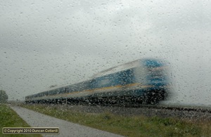 Stupid things to do to pass the time on a dull, wet day part 1. 223.070 was working ALX38708 south past Weinhausen, between Buchloe and Kaufbeuren, on 16 October 2010. The train was photographed through the car windscreen using a shutter speed of 1/10sec and an aperture of f/29 to keep the water drops sharp.