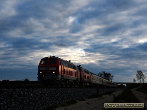 218.445 and 218.419 reflected the last of the afternoon's meagre light on 19 October 2010 as they led EC195 northwards past Weinhausen, south of Buchloe.