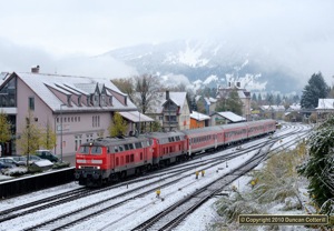 One of the few loco hauled DB Regio services to run west of Kempten, RE32703 from Ulm to Oberstdorf, arrived at Immenstadt behind 218.434 and 218.467 in Christmas card conditions on 20 October 2010. This train is regularly double headed as far as Immenstadt to position a loco to work north on IC2012.