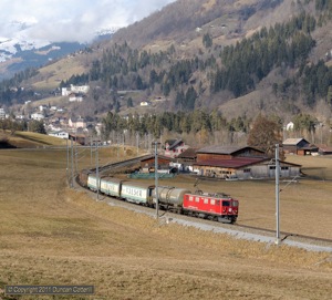 An hour after arriving with 5225, 608 left Ilanz with freight 5232, bound for Landquart, on 17 February 2011.
