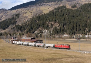Freight traffic to Disentis consists mainly of cement tanks bound for the Gotthard Base Tunnel workings at Las Rueras near Sedrun on the MGB. 704 was photographed near Ilanz, working train 5236 back to Ilanz on 17 February 2011.
