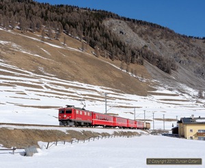609 was promoted to RegioExpress duty on 19 February 2011, working RE1327 from Landquart to St. Moritz and RE1342 back. The loco was photographed accelerating RE1327 away from S-chanf.