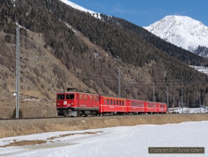 602 approached Zernez with train 1948, the 14:02 Pontresina - Scuol-Tarasp on 19 February 2011.