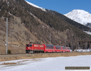 Half an hour after 602 passed, 704 approached Zernez with RE1350 from St. Moritz to Landquart on 19 February 2011.
