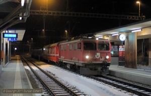 One of the holy grails of railway photography is capturing moving trains at night. 607 slowed to a halt at Filisur with mixed train 4109 at 06:09 on 23 February 2011.