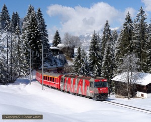 Two of the five Landquart - Davos turns were still loco hauled during my visit. 642 approached Cavadürli with RE1037 on 23 February 2011.