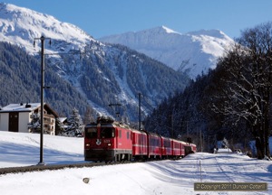 633 descended from Klosters towards Klosters Dorf with RE1248, the 14:40 from Scuol-Tarasp to Disentis/Muster, on 23 February 2011.