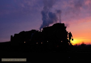  JS 8077 received attention at Dongbolizhan before resuming coal train duties.