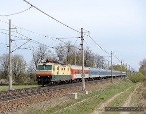 151.023 has regained its communist era livery, complete with orange strip. All that's missing is the red star. The loco was photographed near Pardubice-Opocinek with Ex146, the 07:48 from Zilina to Praha hl.n., on 11 April 2011.