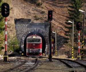 Another of Zvolen's specials, 754.054 left one of the many tunnels between Banska Bystrica and Turcianske Teplice with Zr1842, the 13:18 semi-fast from Zvolen to Zilina, on 28 March 2011. The train was entering the station at Harmanec Jaskyna.