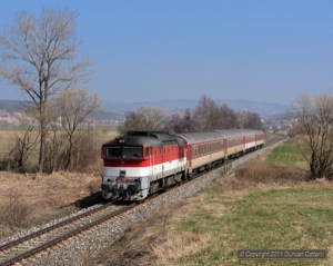 East of Jesenske the only loco hauled passengers are the fast trains. 754.005 approached Gemerska Panica with R932, the 09:05 from Presov to Zvolen, on 30 March 2011.