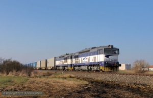 Pairs of class 756 diesels are diagrammed to work a number of Zvolen - Kosice freights but this northbound, through Tornala at 08:00 on 31 March 2011, came as a surprise. The locos were 756.005 and 756.008.