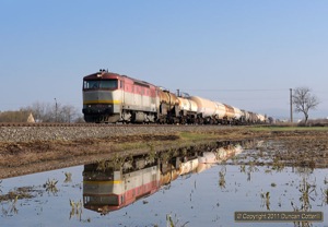 751.125 rolled south with a long freight near Tornala on 31 March 2011.