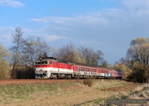 R934 again, this time hauled by 754.082 on 4 April 2011, and much further west near Podrecany.