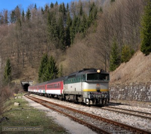 754.035 was photographed passing through Dolny Harmanec on Zr1841, the 13:15 Zilina - Zvolen, on 8 April 2011.
