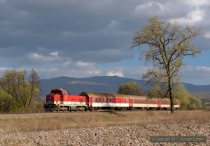 The dark clouds were gathering as 736.102 left Novaky on Os5005, the 14:48 Nove Zamky - Prievidza, on 9 April 2011.