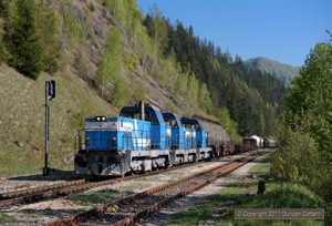 This northbound freight was hauled by triple-headed class 736s on 4 May 2011. 736.017 piloted 736.005 and 736.006 through Dolny Harmanec in the late afternoon. 