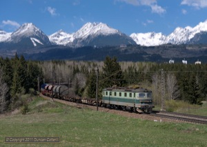 It was good to see so many class 183s in use during my brief visit to Strba. 183.013 led an easbound freight away from Strba on 8 May 2011. The snowcapped peaks of the High Tatra dominate the background.