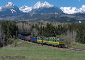 131.066 and 131.065 led a long eastbound coal train down the bank from Strba on 8 May 2011. These twin units are the mainstay of freight services on the Zilina - Kosice line.