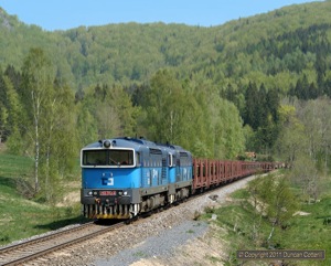 Later on the morning of 29 April 2011, 753.762 and 753.763 led a long rake of empty car carriers back towards Mlada Boleslav to collect another load of new Skoda cars for export. The photo was taken a short distance north of Oldrichov v Hajich.