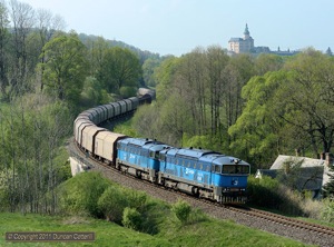 753.778 and 753.779 snaked around the curves in the Smeda Valley between Frydlant v Cechach and Raspenava with a long southbound freight on the afternoon of 29 April 2011. 