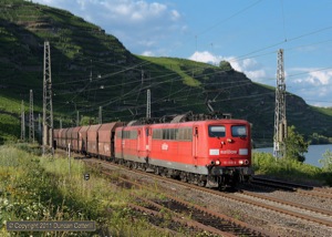 Heavy coal trains are common on the Moselstrecke. 151.018 and 151.152 led a southbound working past Winningen on the evening of 6 July 2011.