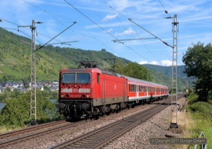 143.647 was photographed north of Bullay with RB12214, the 09:40 Koblenz Hbf - Trier Hbf stopper, on 7 July 2011. Many RB services were formed of double-deck stock but this one was composed of single-deck 