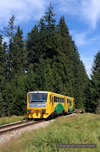 814.134 was photographed north of Nove Udoli on Os18006, the 09:41 from Cicenice, which it had worked from the south end of the engineering blockade at Zbytiny. The photo was taken on 11 August 2011.