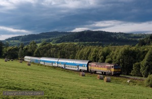 The low evening light caught 749.100 and Os8127/8126 on the approach to Horice na Sumave at 18:37 on 13 August 2011. 