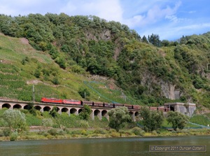 151.054 and 151.126 left the Prinzenkopf Tunnel at Pünderich with a southbound iron ore train on 6 September 2011