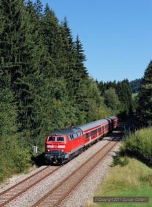 218.467 worked the 14:35 Kempten - Lindau empty stock past Ellhofen, east of Röthenbach, on 10 September 2011. This train runs on Saturday afternoons only.