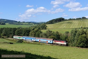 749.254 trundled eastwards from Horice na Sumave with Os8115/8114 on 15 September 2011.