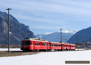 The Be4/4 motor coaches used on Chur area suburban duties will shortly be replaced by new units currently being delivered by Stadler. An unusual combination powered by 515 and 512 left Bonaduz with train 1564 on 7 March 2012.