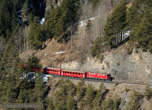 703 was a surprise substitution for one of the uglier Ge4/4iiis on trains RE1120 and RE1129 on 10 March 2012. The Ge6/6ii climbed towards Filisur with the 09:58 Chur - St.Moritz in glorious light. 