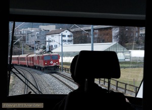 A driver's eye view of 605 and 610 heading for Disentis with RE1216 on 11 March 2012. There aren't many good things to say about the ABe8/12 units but the view forward from the first class compartment is excellent. 