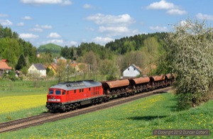 An unidentified stone train, hauled by 232.359, descended the bank at Lehendorf on 3 May.