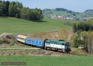 754.022 rolled down the hill from Horice na Sumave towards Mezipotoci with Os8111/0 on 30 April. This is one of a number of locations that had always been overgrown when I'd visited the line before.