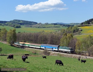 754.022 hauled Os8115/4 back towards Ceske Budejovice on 1 May. Coupled behind the third coach is failed 754.039 and its train Os8111/0.