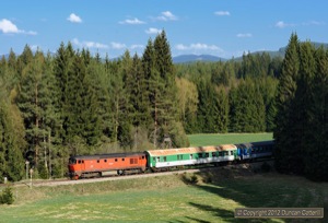 The shadows were rapidly sweeping across the line by the time 749.252 approached Stozec with late running Os8121/0 on 1 May.