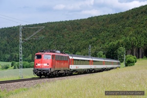 115.459 made a second unscheduled trip from Stuttgart to Singen and back on the afternoon of Saturday 2 June. The 115 is seen here climbing out of the Donau Valley, south of Tuttlingen, with IC187, the 13:56 from Stuttgart - Zürich.