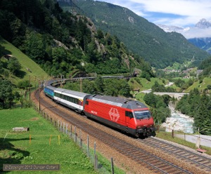 460.017 passed Dangel, between Zgraggen and Gurtnellen, on IR2173, the 12:04 passenger from Basel SBB to Locarno, on 2 September 2012. Class 460s are booked to work over half the IR services over the Gotthard but they were often substituted by Re4/4iis.
